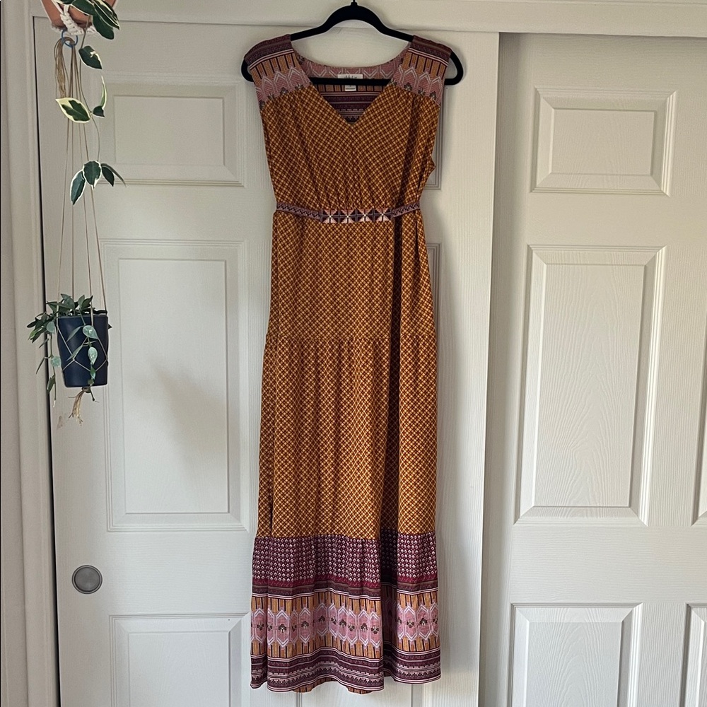Tiered maxi dress with gorgeous orange, pink, and burgundy pattern.